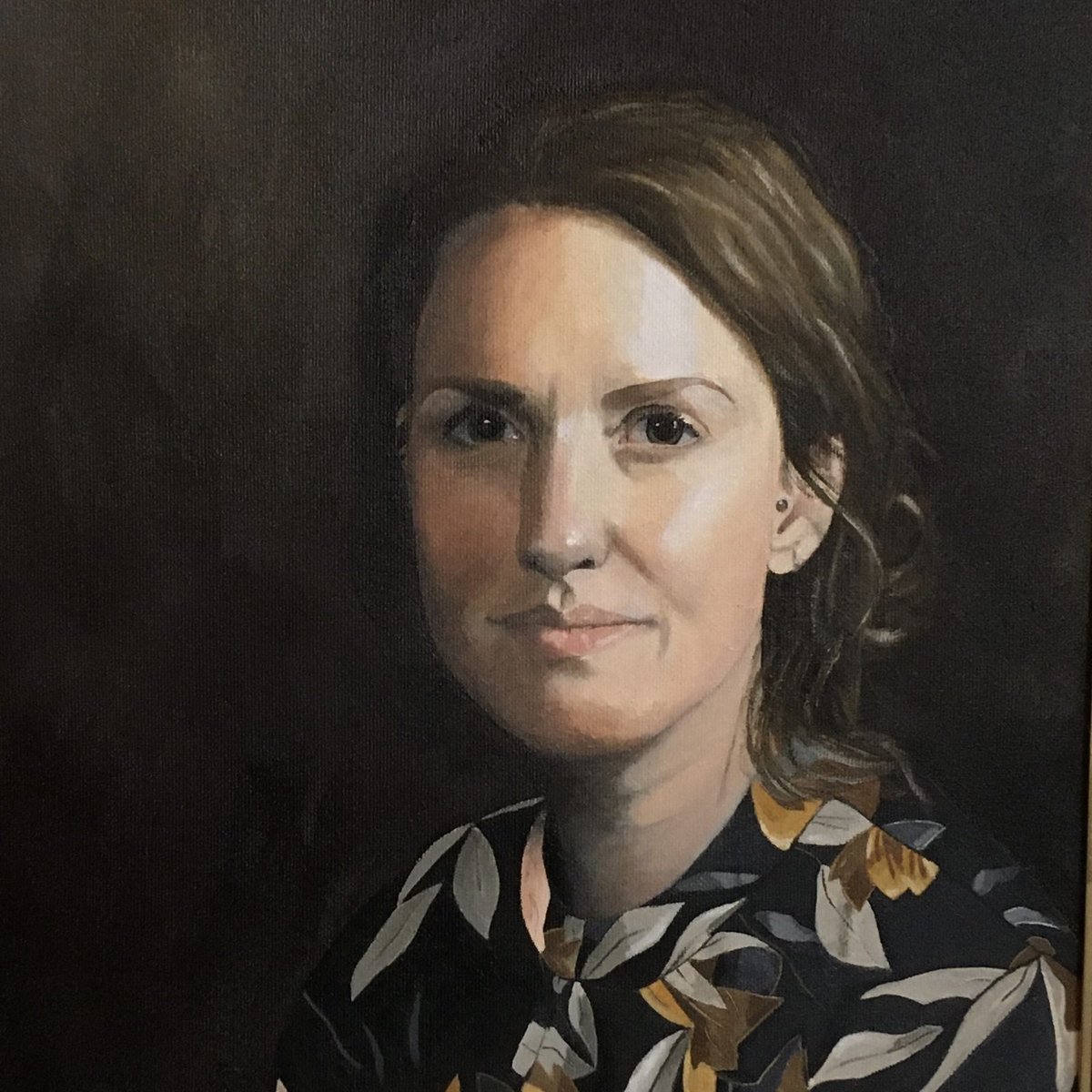 Portrait 21/001, 2021 — contemplative sitter draped in muted green cloth.